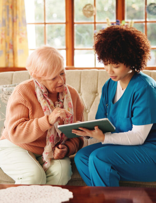 Tablet, healthcare and nurse with senior woman in retirement home for consultation with research. Digital technology, medical checkup and caregiver with elderly female patient for treatment plan
